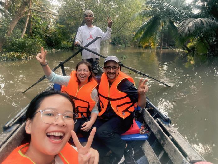 Dorm bed in center with balcony, rooftop and floating market tour since 2025