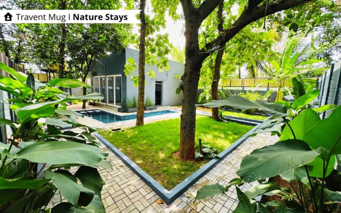 The Calms Villa by Travent Mug