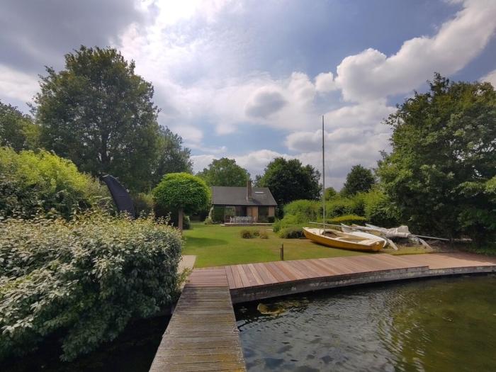 Waterfront house with big garden