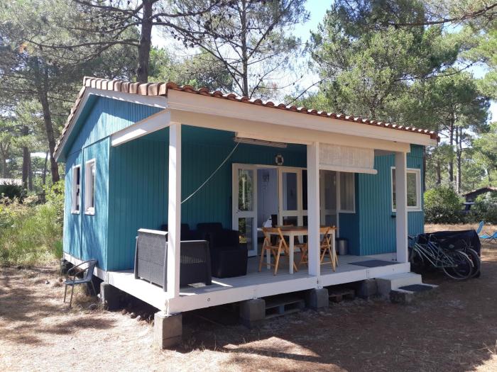 LOUE JOLI CHALET EN BOIS -POUR 2 PERSONNES AU CHM de MONTALIVET Centre Naturiste à partir de 90 euros la nuitée