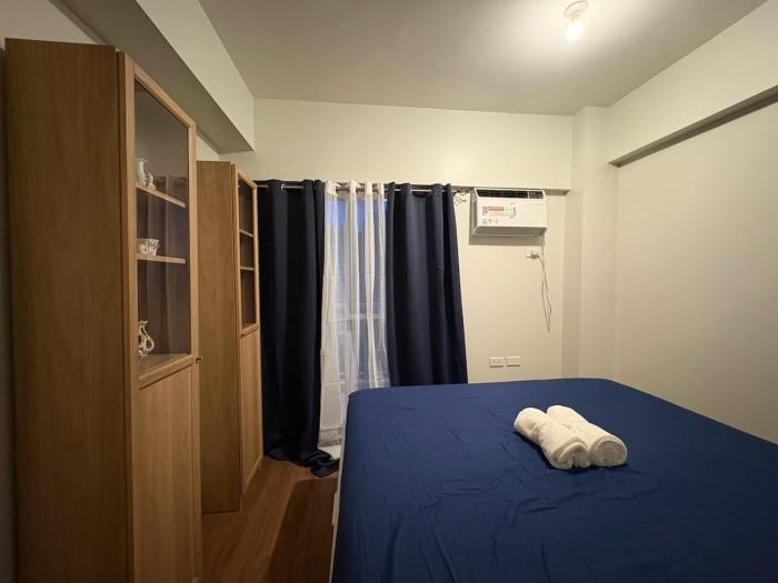 Modern 2BR Condo with Balcony in Central Manila