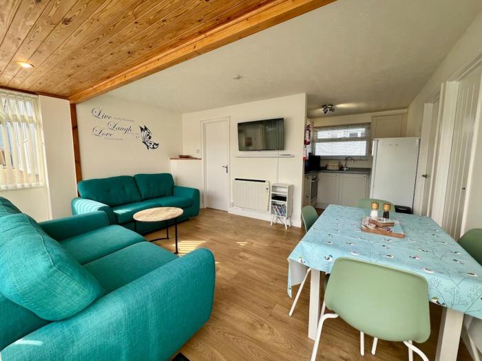 Beach Cottage 43, A stones throw from the sea