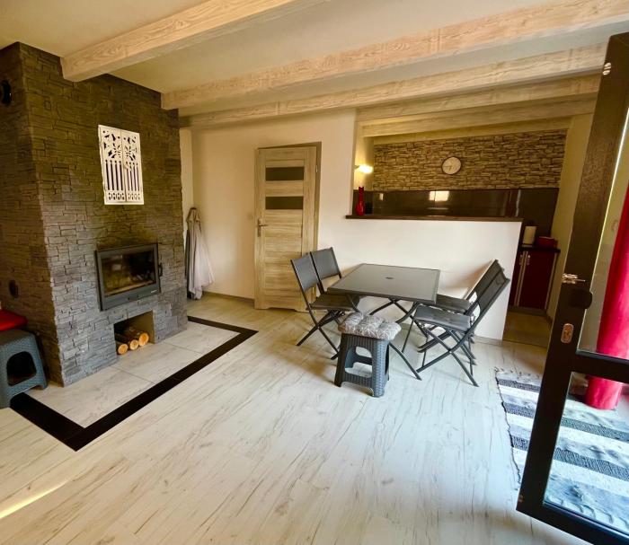 Domek na źródlanej polanie