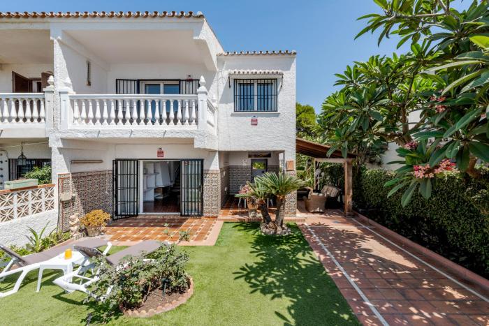 WintowinRentals Casa con jardín privado en primera línea de playa