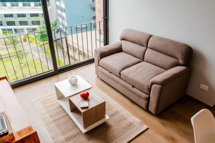 Bright 1BR with Gym and Chill Terrace