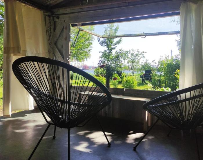 Minimalist riverside hideout