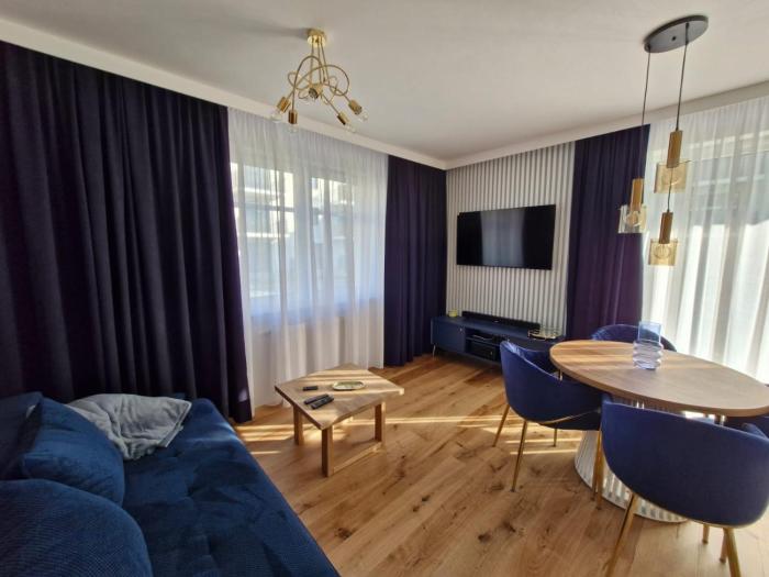 Niebieski apartament w Wileńska Park i prywatne miejsce w garażu podziemnym