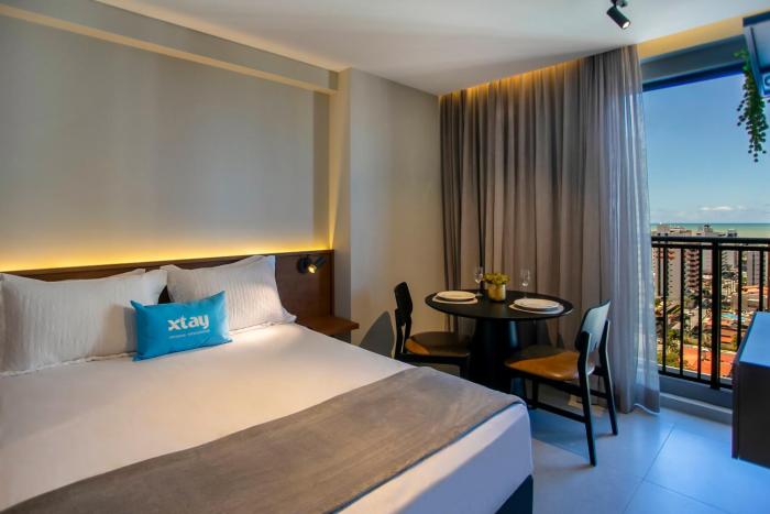 Simple Smart By Xtay - Bleisure em João Pessoa: piscina, academia e lavanderia perto do Tropical Center e HNSN