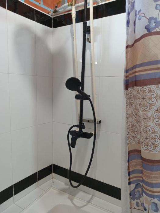 Bed and bath at Villacarolina