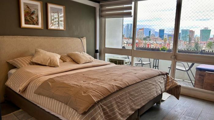 Amplio dpto a pasos del Parque Arauco con Aire Acondicionado