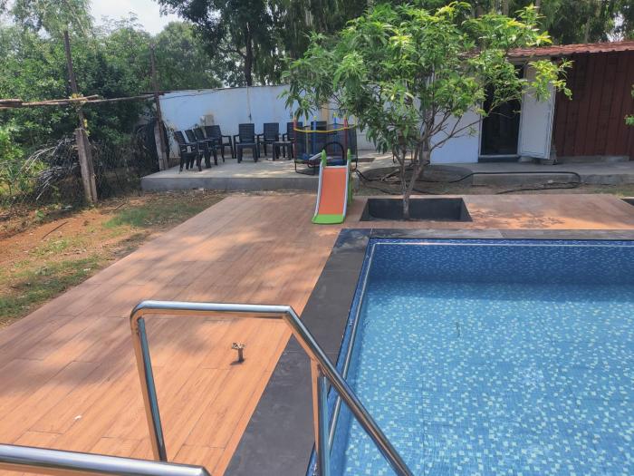Sivarama garden resort 5 AC BHK with 2 swimming pools& Box cricket , kichan withequipment ,BBQ,near bheemili beach road ,vishakhapatnam
