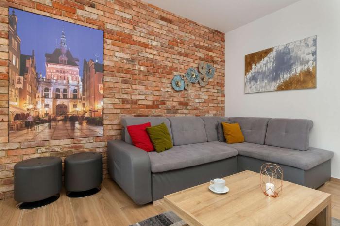 Stylish Apartment in Gdańsk Center with Garden and Parking by Noclegi Renters