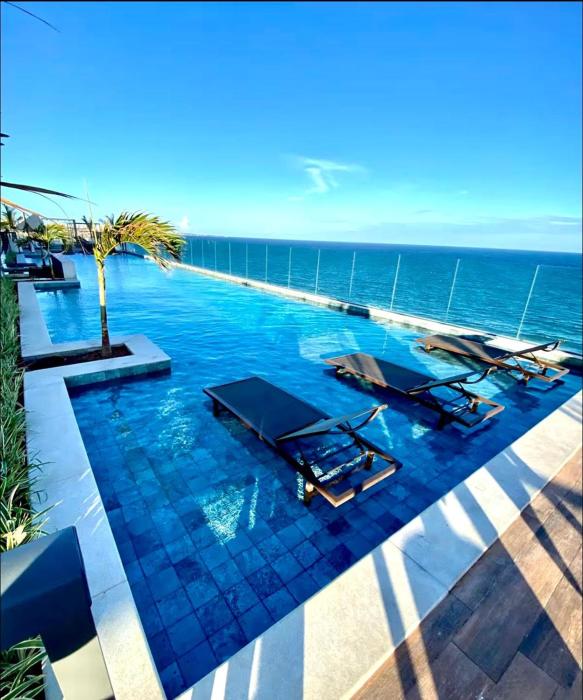 Studio Art - Apartamento climatizado - Prédio a beira-mar, com jacuzzi e piscina - Praia de Armação