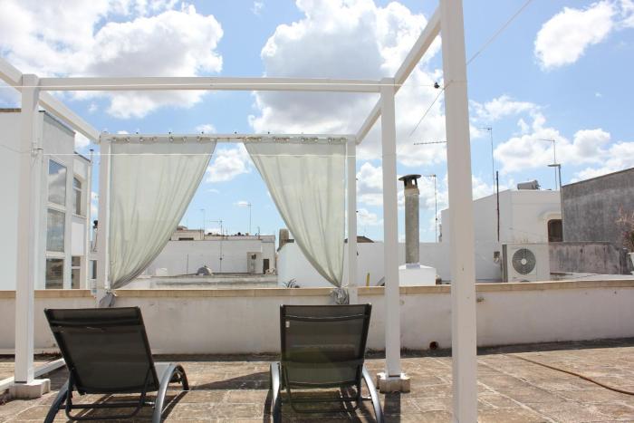 Camera della radio con terrazza nel centro storico di Racale