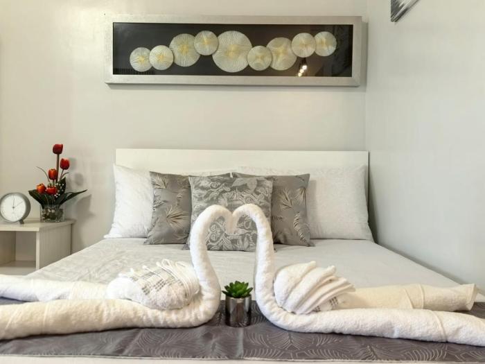 Verdant Resort Condo with Pool, Balcony, Near Airport and Beach