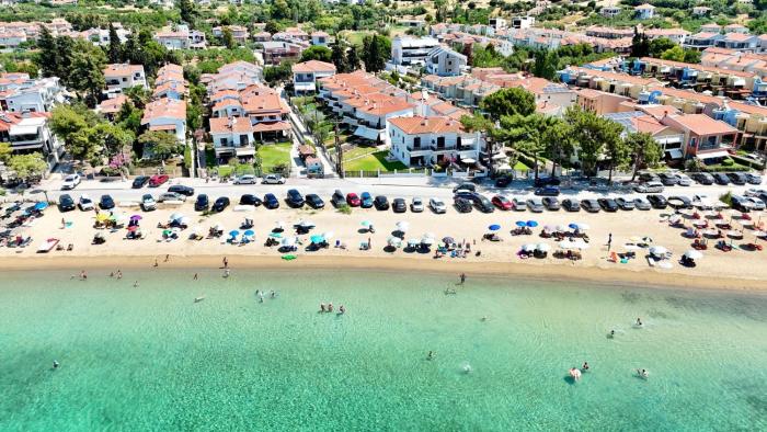 Beachfront Bliss in Nikiti, Spacious 2 Story Villa with Stunning Sea Views