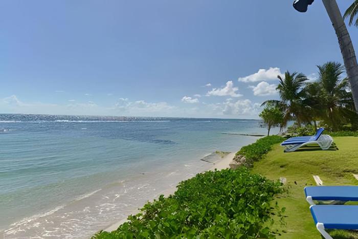 Caribbean Golden Sunset View,1BDRM Beachfront Apt.