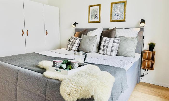 Nordlicht, Olpenitz - moderne Ferienwohnung in direkter Strandnähe mit eigenem Eingang, Sauna, Kaminofen, Terrasse und Parkplatz