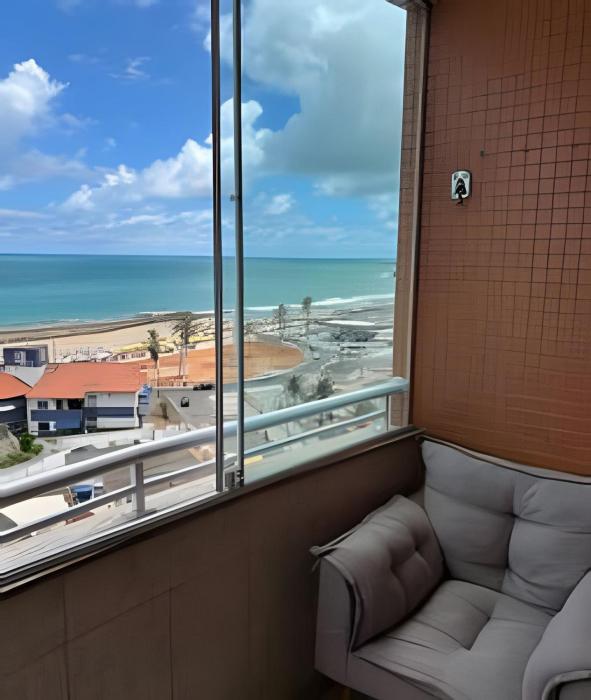 Flat praia a beira-mar