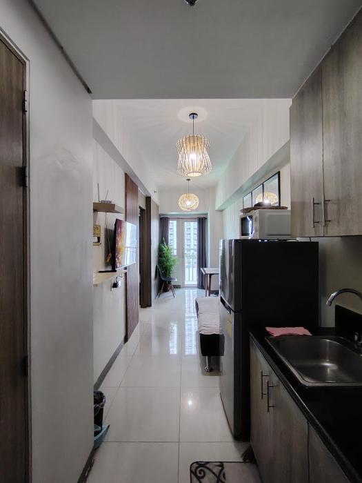 CozyStay by MA Condotel-Coast Residences