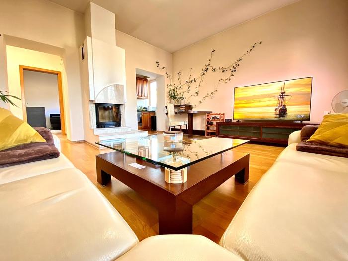 Moderný apartmán s krbom