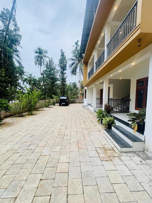 CT HOMESTAY, Omassery