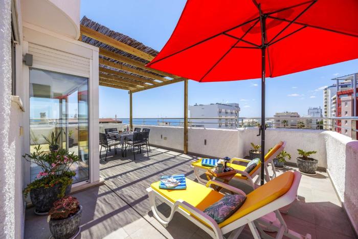 Penthouse Living with Rooftop Terrace & Sea View