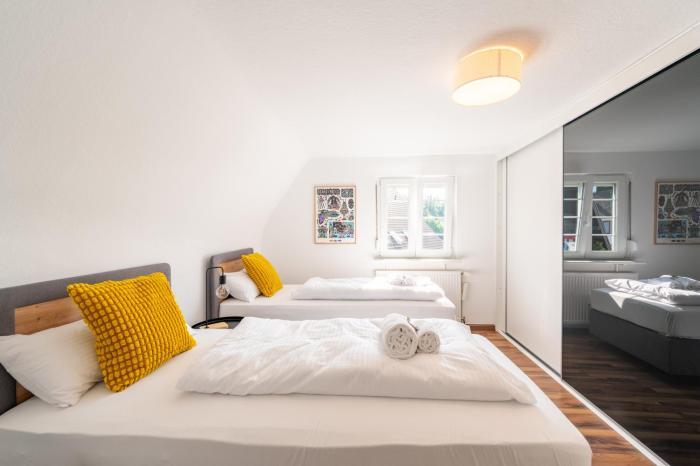 SCHUSTERjunge Homes I Zentrale Ferienwohnung I neu & modern I 2 Zimmer bis 4 Personen