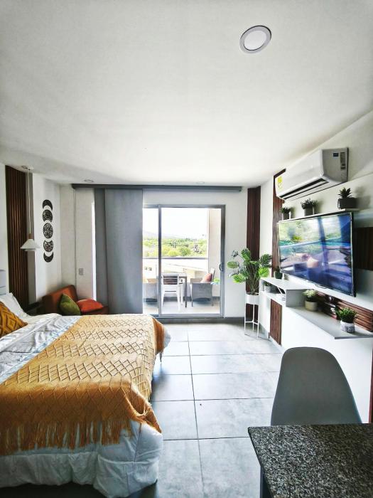 Modern suite steps from the sea