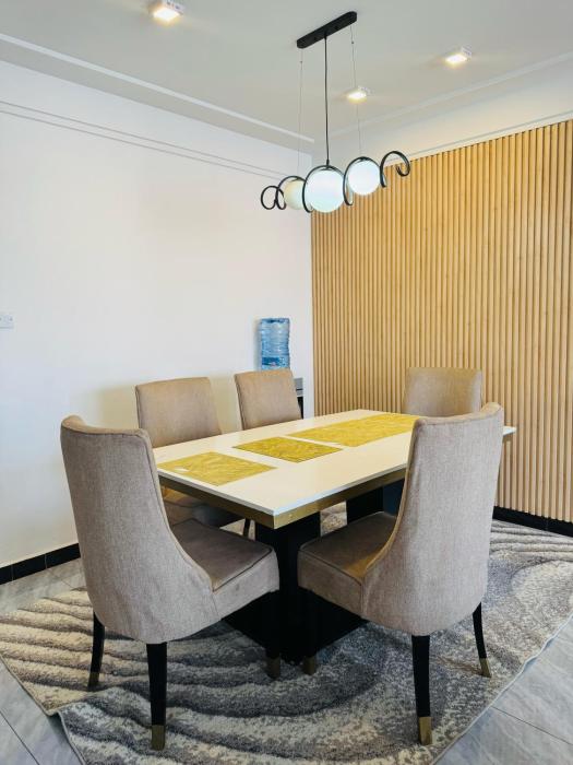 The comfort executive loft three bedroom apartment with amazing breathtaking city views , swimming pool ,gym ,private ample parking space with designated child playground area