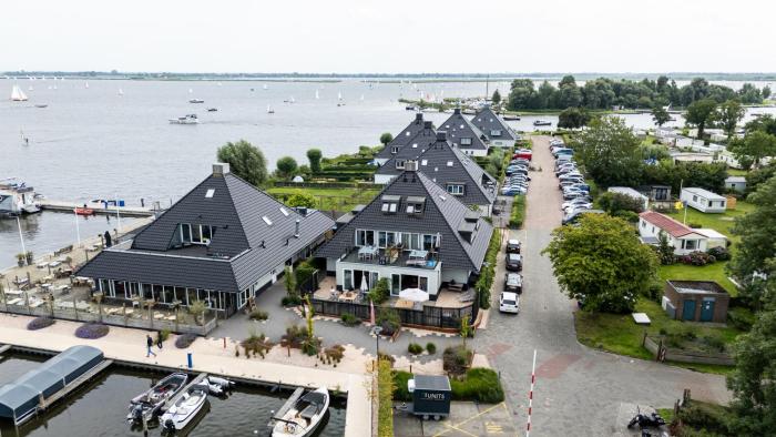 Spacious Water Apartment with Terrace & BBQ Garden in Offingawier