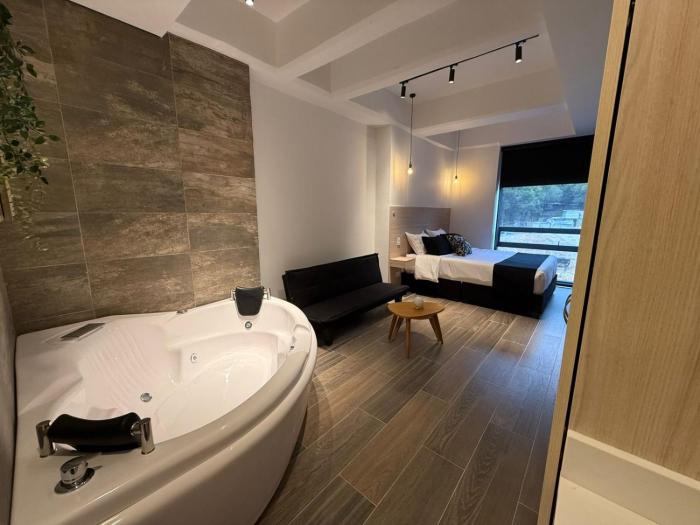 - Apartamento con Jacuzzi Privado y Cama Queen -