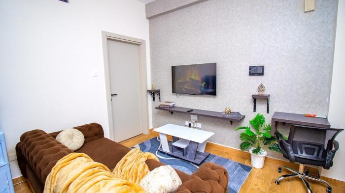 Stylish 1 Bed with pool & gym and scenic NBO Views