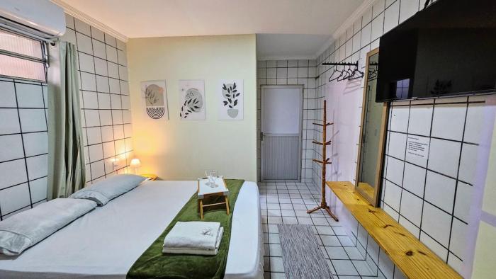 Tiny House - Centro d convenções700m, AC, Wifi, Garagem