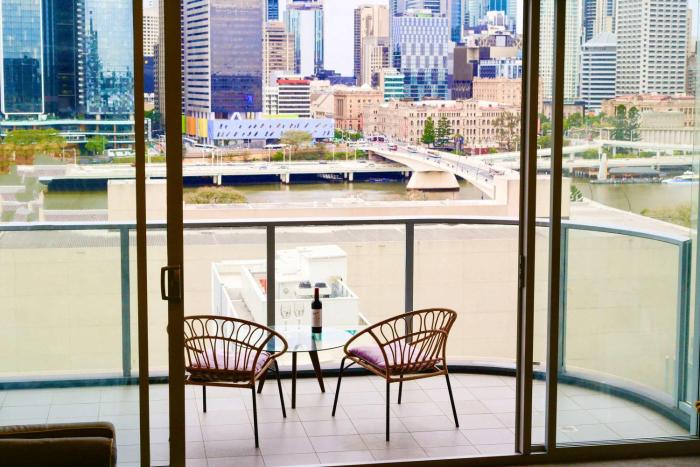 Tranquil River-View 2-Bedroom High-Rise Apartment