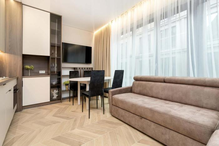 Superior Apartment near the River in the City Center on Granary Island by Noclegi Renters