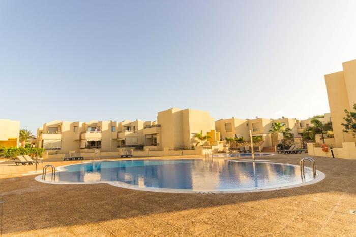 2 bed house near the beach with swimming pools