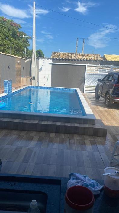 Casa em itanhaem com piscina, churrasqueira a poucos minutos da praia