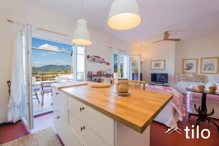 Among olive trees by the sea by Tilo