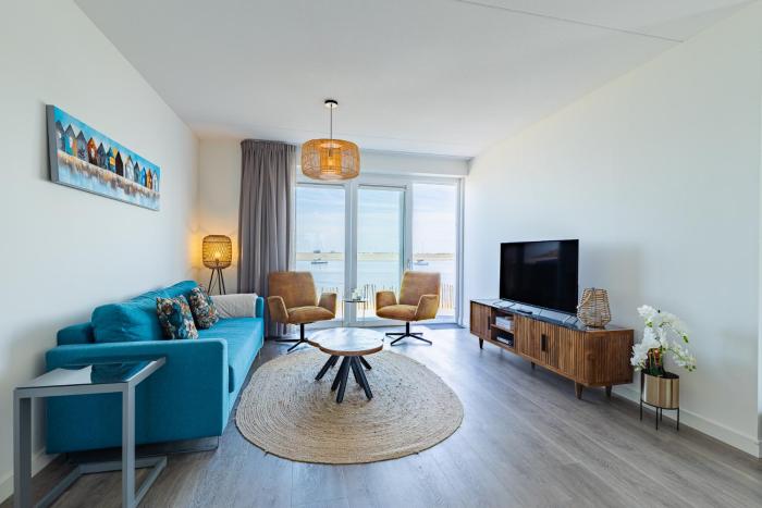 Vakantiewoning aan het strand - tuin en terras met haven- & zeezicht - Vista Maris - Nr 14