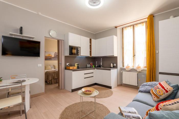 Cozy Milano Retreat with Laundry & Smart TV