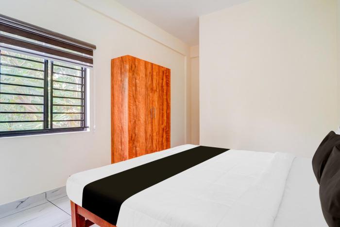 Hotel O HMT Colony Kochi Formerly Pullans Arcade