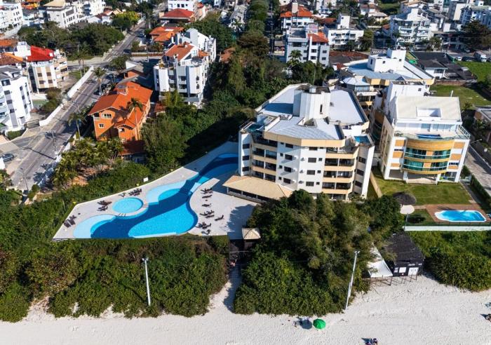 C125 Charmoso apartamento pé na areia de 1 quarto