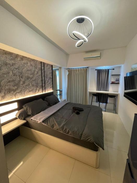 Studio Orchard Apartment Pakuwon Mall by ASH with wifi, Netflix, water heater