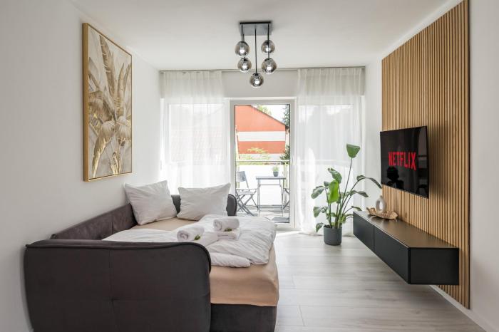Moderne Wohnung mit Balkon - nahe Kurpark & Messezentrum