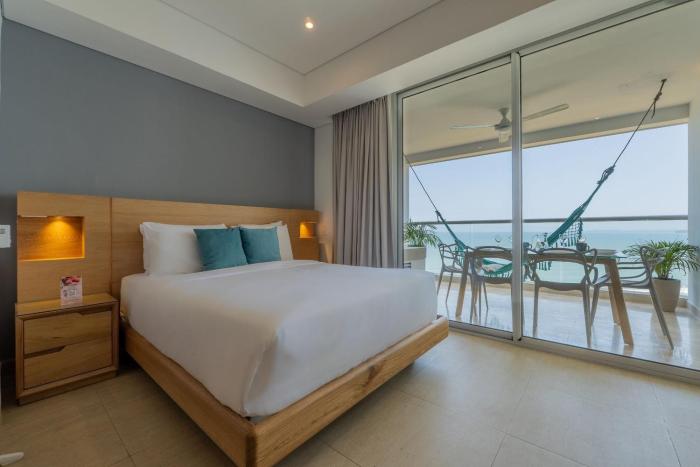 Suite con 2 camas, vista al mar y piscina CB1223