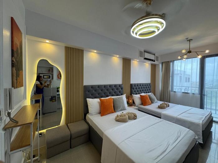 Shore 2 Residences RM 19106 Pool View by Prime Stay MOA