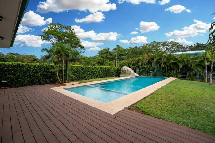 Modern Home with Lush Mountain Views and Spectacular Shaded Terrace in Private Gated Community