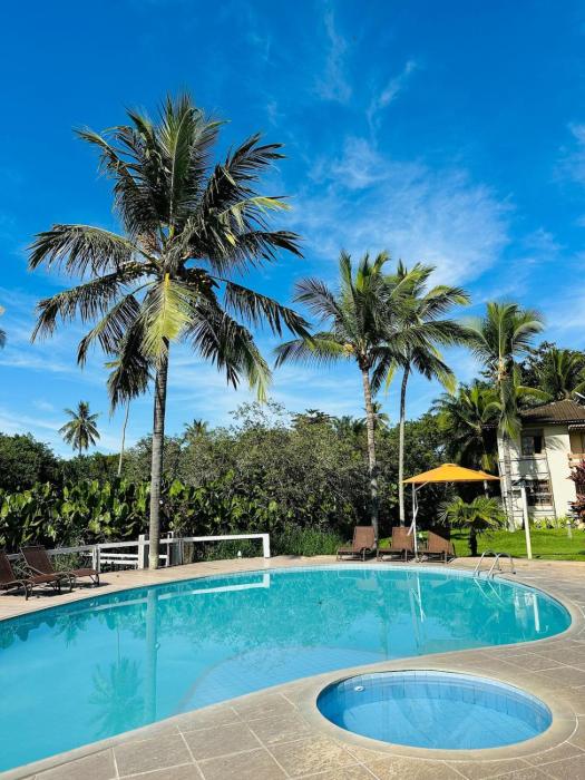 Apartamento com piscina e acesso exclusivo à praia Ambiente confortável, com colchões e travesseiros de qualidade, em uma localização estratégica, perto de tudo para você aproveitar sem precisar de carro