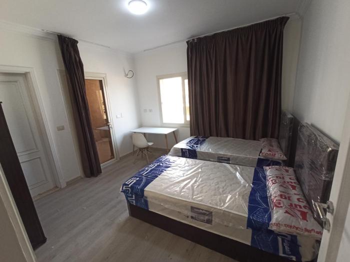 غرف فندقية بجوار الجامعةالاوربية و الكندية والالمانية بكمبوند المقصد العاصمة الادارية